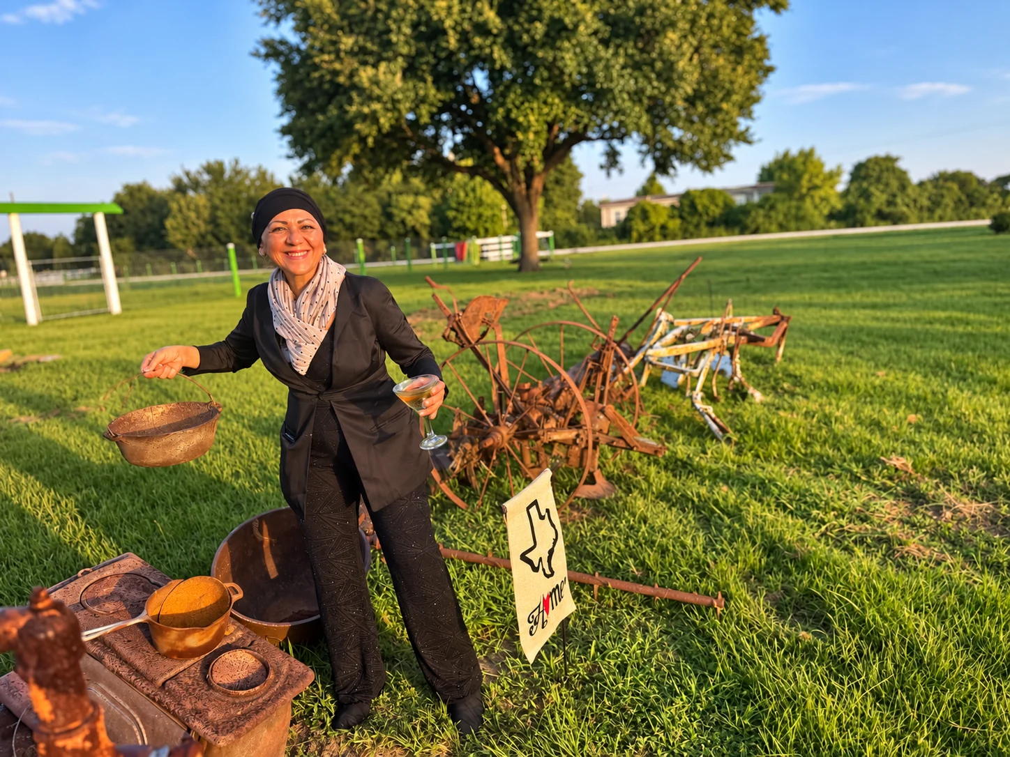 Summer Gala guest with heritage objects on the Big Prayer Museum grounds